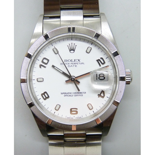 7184A - A gentleman's stainless steel Rolex Oyster Perpetual Date wristwatch, reference 15210, fitted to a s... 