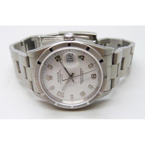 7184A - A gentleman's stainless steel Rolex Oyster Perpetual Date wristwatch, reference 15210, fitted to a s... 