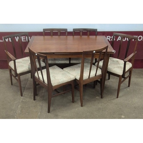 79 - A Younger Volnay afromosia extending dining table and six chairs, designed John Herbert