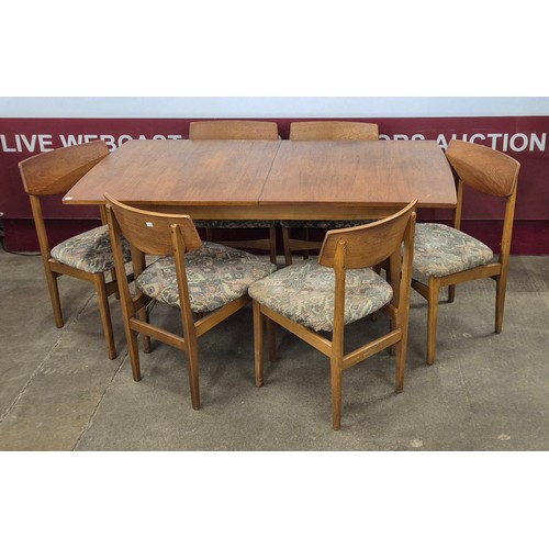 83 - A Nathan teak rectangular extending dining table and six chairs