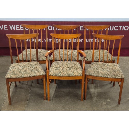 87 - A McIntosh teak rectangular extending dining table and six chairs