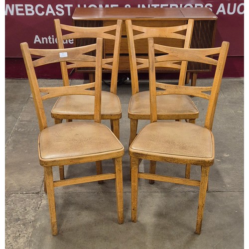 95 - A set of four beech kitchen chairs