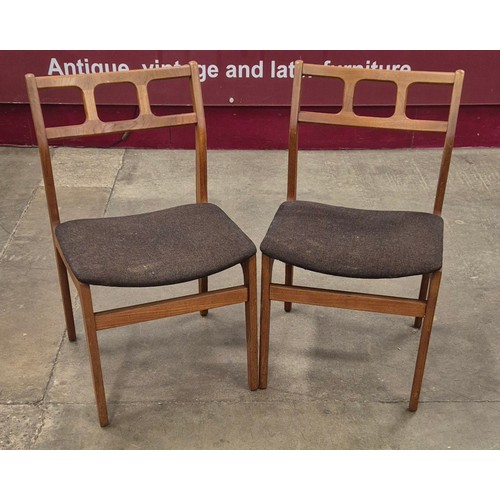 94 - A pair of Danish D-Scan teak dining chairs, designed by Johannes Andersen