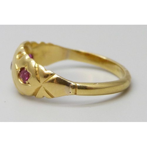 7006 - An 18ct gold, ruby and diamond ring, 2.7g, O