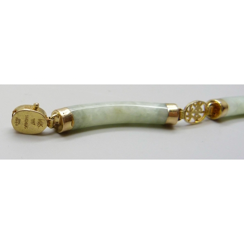 7020 - A Chinese 14ct gold and jade coloured stone bracelet, 10.5g, 19cm