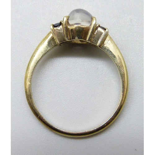 7023 - A .800 silver gilt moonstone and sapphire ring, P