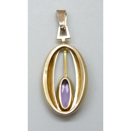 7028 - A 9ct gold amethyst set pendant, 3.4g, 4.1cm including bale