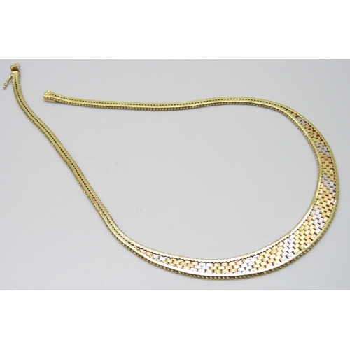 7040 - An 18ct three tone gold textured necklace, 49g, 42cm