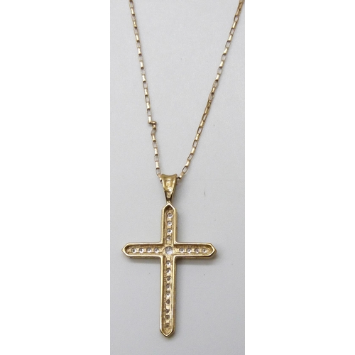 7046 - A 9ct gold cubic zirconia set cross pendant on chain, 3.5g, 3.7cm pendant