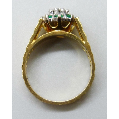 7053 - An 18ct gold green stone and diamond fretwork cluster ring, 6.2g, N