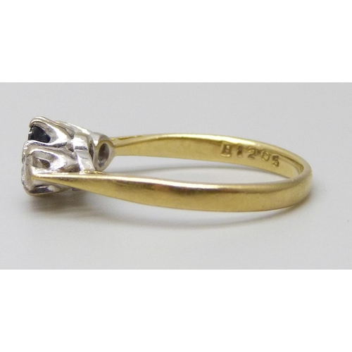 7055 - An 18ct gold, sapphire and diamond ring, 2.2g, I