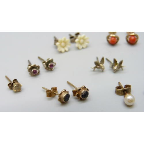 7068 - A collection of earrings including three yellow metal pairs, 2g