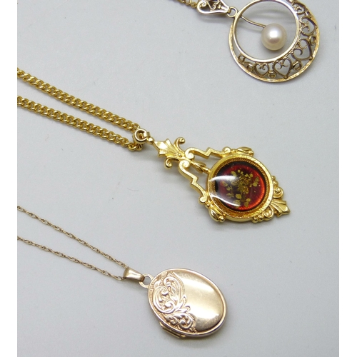 7069 - A 9ct gold pendant, 1.4g, a 9ct gold yellow metal locket on a 9ct gold chain, 1.8g, and a collection... 