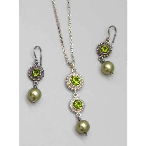 7099 - A matching silver bracelet, necklace and earrings set with pearls and green stones, 25g