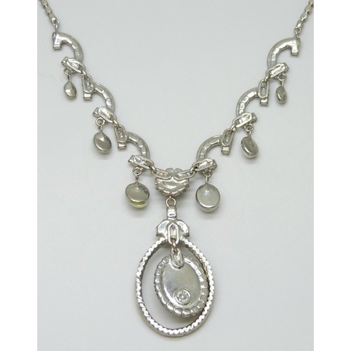 7111 - A Butler & Wilson necklace, 48cm