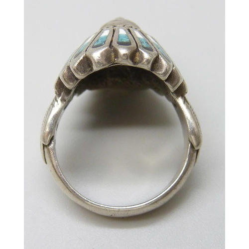 7116 - A silver Native American Indian Chief ring set with turquoise, 12.9g, P