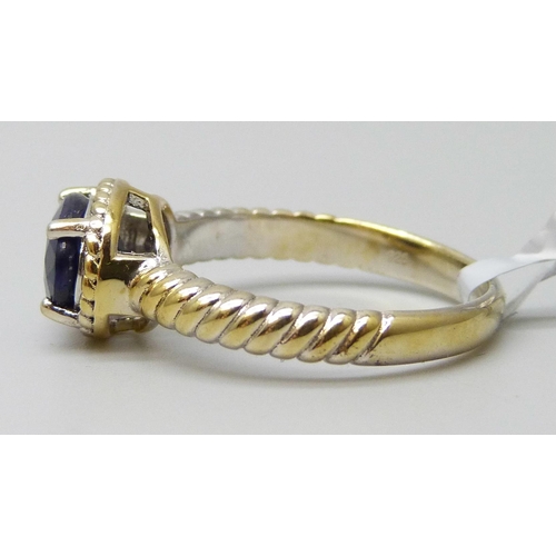 7120 - A Gemporia silver gilt oval sapphire ring, S