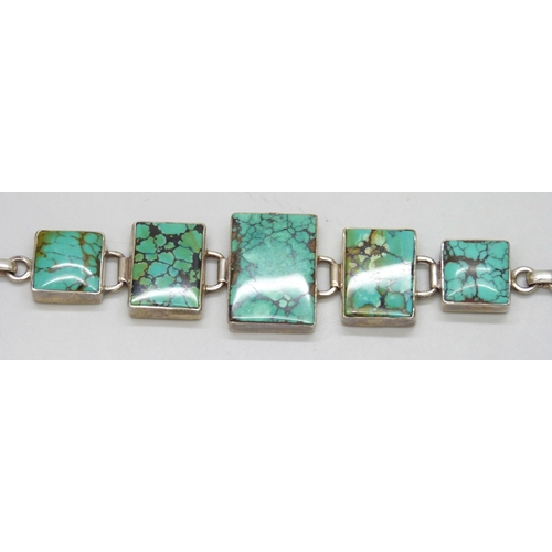 7136 - A silver bracelet with turquoise style inlay, 35g, 20cm