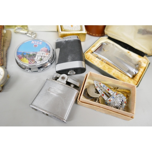 7172 - A box of mixed jewellery, lighters, wristwatches, pens including stone set brooches, bangle and pin ... 