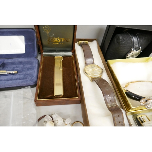 7172 - A box of mixed jewellery, lighters, wristwatches, pens including stone set brooches, bangle and pin ... 