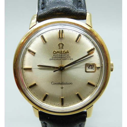 7179 - A 1964 18ct gold Dennison cased Omega Constellation wristwatch with original period Omega buckle on ... 