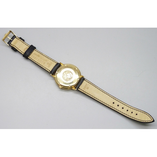 7179 - A 1964 18ct gold Dennison cased Omega Constellation wristwatch with original period Omega buckle on ... 