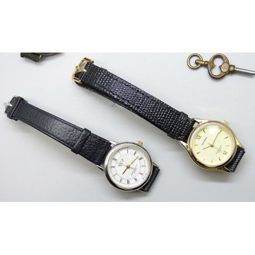 7180 - Two silver wristwatches, three others, a compass and pocket watch keys