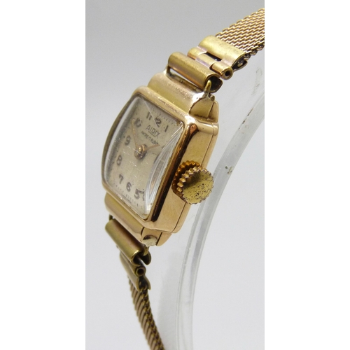 7181 - An 18ct gold cased lady's wristwatch on a plated strap, 17mm including crown