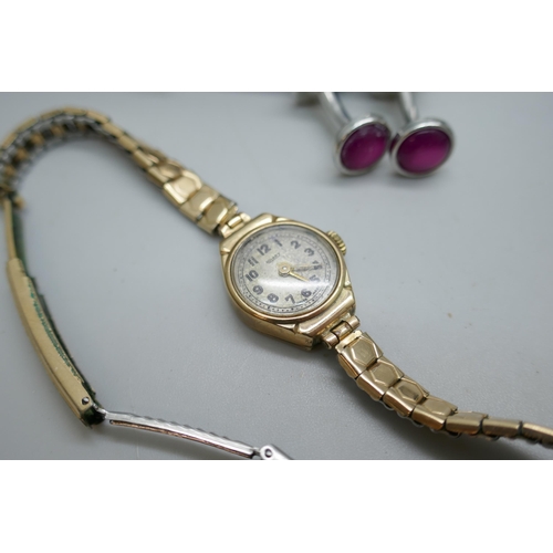 7190B - Five wristwatches including Limit, Citizen and a 9ct gold Rotary lady's wristwatch, also a medallion