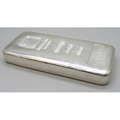 7215 - A Baird & Co. London .999 fine silver ingot, 1000g, 039440