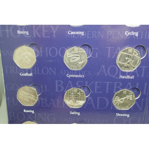 7218 - A complete set of 2011 Olympic 50p coins, 29 different sports, in sports album