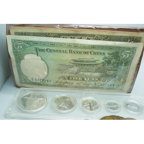 7225 - Coins; Canada six coin set, a German coin set, foreign coins and other coins, and two Chinese bank n... 