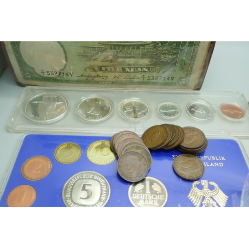 7225 - Coins; Canada six coin set, a German coin set, foreign coins and other coins, and two Chinese bank n... 