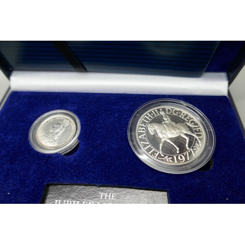 7229 - Coins; The Jubilee Monarchs silver coin set, 1887 silver shilling and 1977 silver crown cased and a ... 