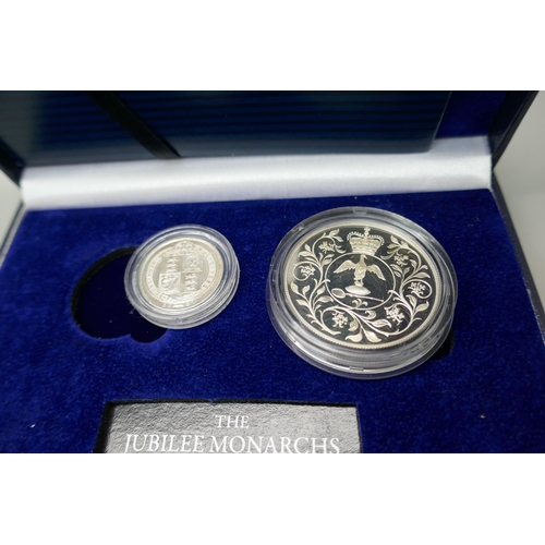 7229 - Coins; The Jubilee Monarchs silver coin set, 1887 silver shilling and 1977 silver crown cased and a ... 