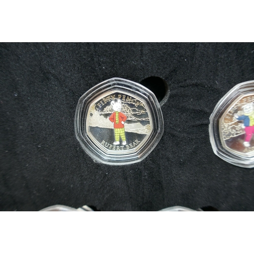 7233 - Coins; an Isle of Man 2020 issue of five 925 silver Rupert Bear collectors 50p proof coin set, cased... 