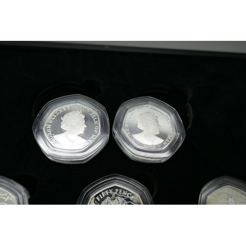 7233 - Coins; an Isle of Man 2020 issue of five 925 silver Rupert Bear collectors 50p proof coin set, cased... 