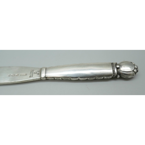 7238 - A silver Georg Jensen preserve knife, London 1934 import Mark, 2g, 134mm