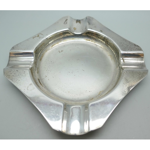 7240 - A silver ash tray, shell salt and nail buffer, total weight 101g