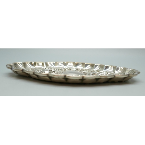 7241 - A Victorian silver embossed tray, Birmingham 1898, 35g, (a/f, one small hole), 11.8cm