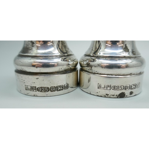 7242 - A silver salt grinder and a silver pepper grinder, Birmingham 2003 and 2005