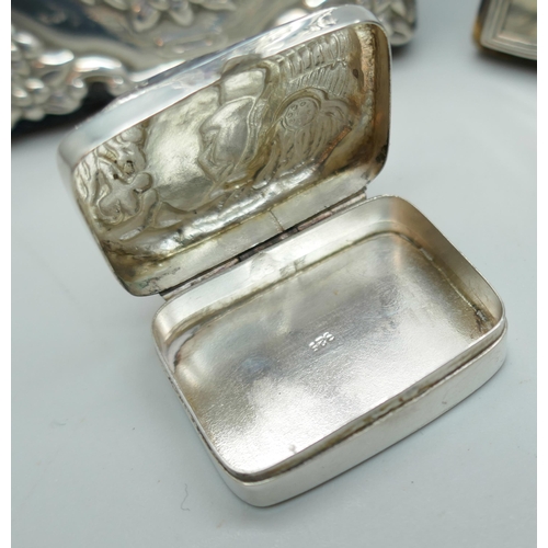 7244 - Two small silver photograph frames, tallest 10.7cm, and a silver pill box