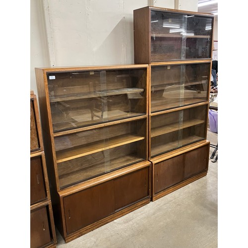 252 - A Simplex oak and glazed sectional stacking bookcase