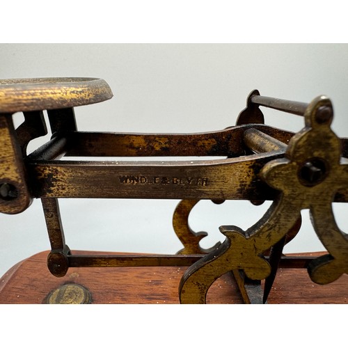 2024 - A set of Windle & Blyth Victorian postal weighing scales on a mahogany base, with brass weights