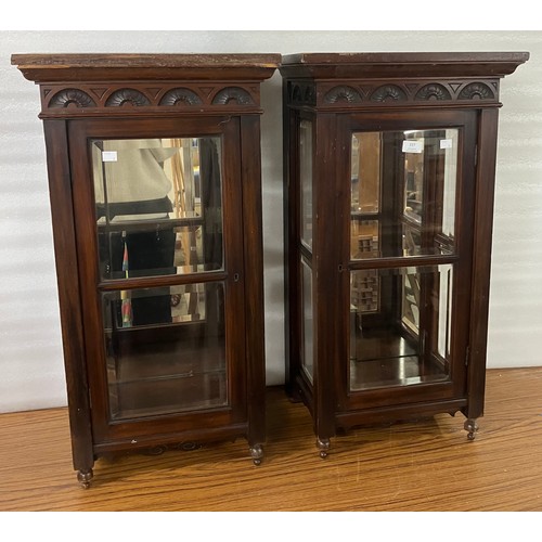 268 - A pair of Edward VII carved mahogany wall hanging display cabinets