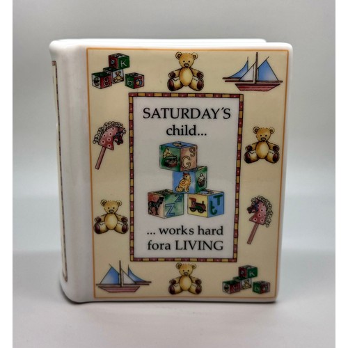 2088 - A Royal Worcester Saturday's Child money box in the form of a book, Days Of The Week, 2004, designed... 