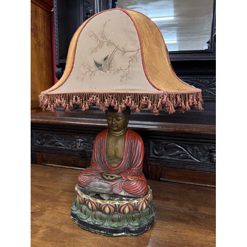 2214 - An Oriental early 20th Century hand painted Buddha lamp base with original shade, 60cm including sha... 