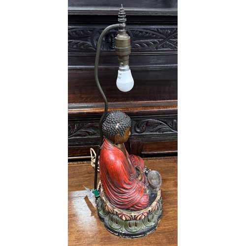 2214 - An Oriental early 20th Century hand painted Buddha lamp base with original shade, 60cm including sha... 