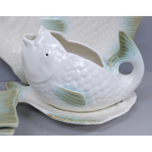 2038 - Six Shorter & Son Clarice Cliff designed fish plates and sauce boat with stand, circa 1930s