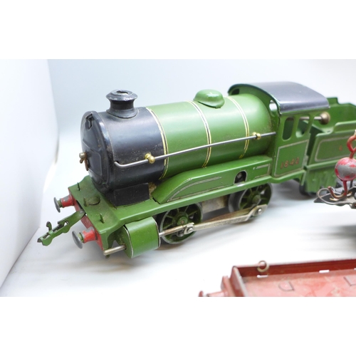 2048 - A Hornby O gauge model railway locomotive, tender and four wagons